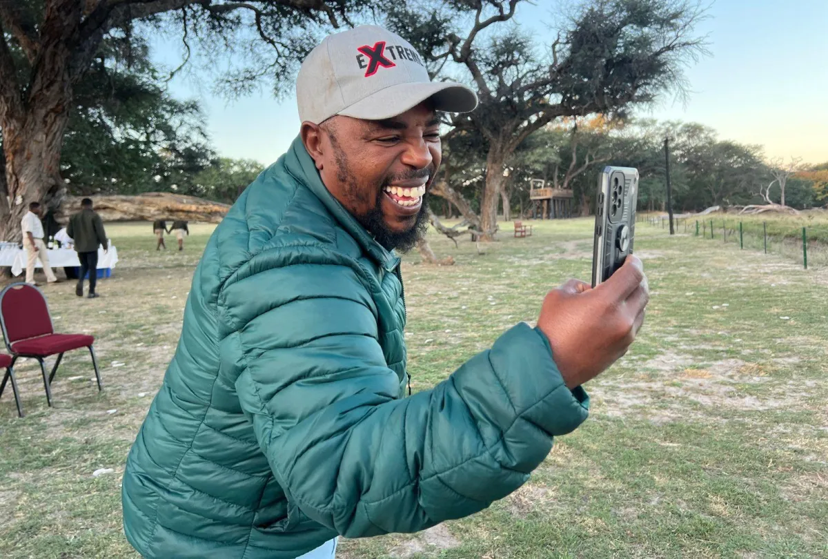 man-smiling-as-he-takes-a-selfie-in-hwange_7377d849afdaaf98a9d8db3bf5dd57e9